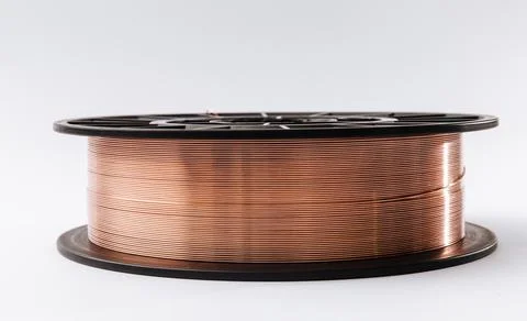 Welding wire spool on a white background Stock Photos