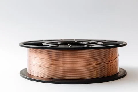 Welding wire spool on a white background Stock Photos