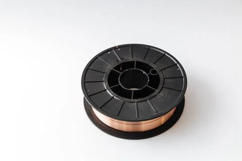 Welding wire spool on a white background Foto stock