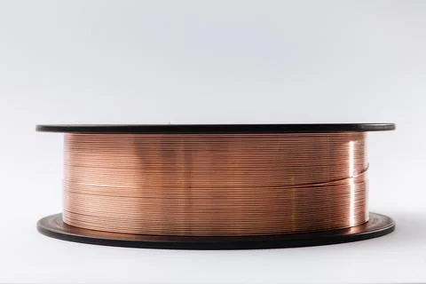 Welding wire spool on a white background Stock Photos