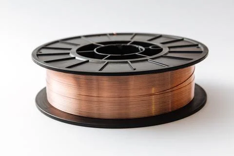 Welding wire spool on a white background Foto stock