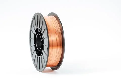 Welding wire spool on a white background Foto stock