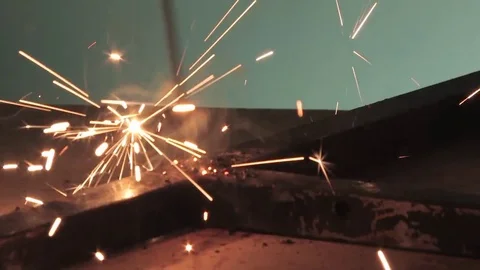 Welding work with electrodes, flickering flashes, hot metal, sparks from welding Video stock 81003171