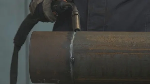 Welding work by a professional factory foreman using modern industrial equipment Stock Footage 125881181