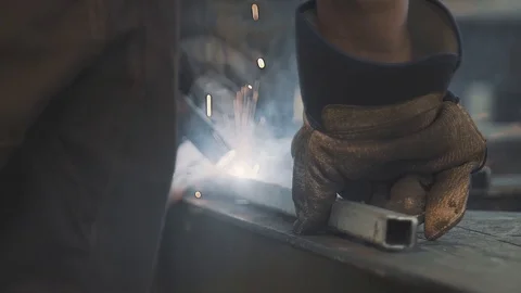 Welding work by a professional factory foreman using modern industrial equipment Stock Footage 125881365