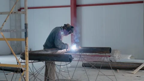 Welding work in a warehouse in production Video stock 279816772