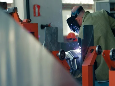 Welding work ; welder welding metal material Video stock 78464839