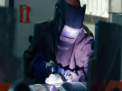 Welding work ; welder welding metal material Stock Footage 78466556