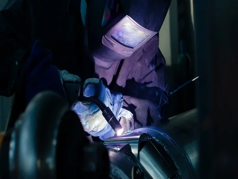 Welding work ; welder welding metal material Stock Footage 78467271