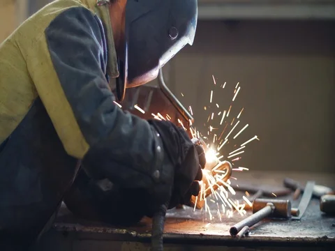 Welding work ; welder welding metal material Stock Footage 78481887