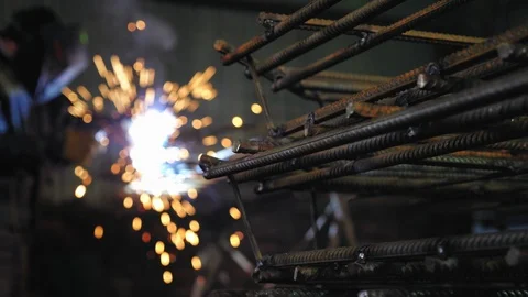 Welding work. Welder welds part to metal construction. Stock Footage 103791605