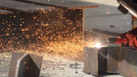 Welding work. A worker is engaged in welding at a factory Stock Footage 285961463