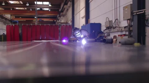 Welding worker - slider, reflection, high quality, industrial Stock Footage 43101713