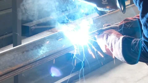 Welding, worker is welding, close-up and welding fumes Stock Footage 164165348