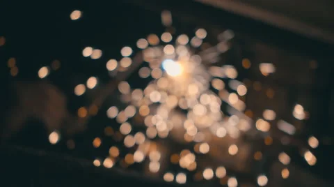Welding works on a black background and a lot of sparks flying around Stock Footage 64878216