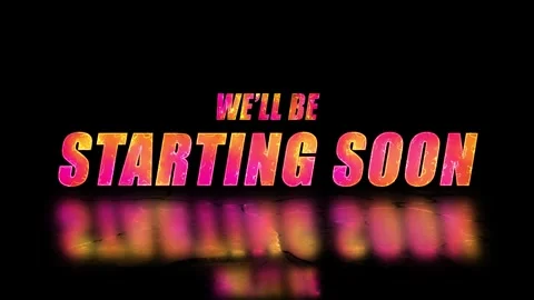 We'll Be Starting Soon fiery text animation in golden and pink with reflection Stock Footage 339660959