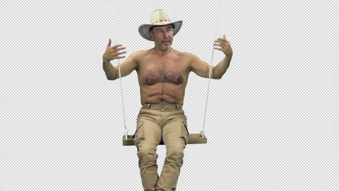 A well-built middle aged man wearing cowboy hat swinging on rope swing, alpha Stock Footage 306096259