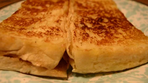 A well cooked two side of toast stock footage Stock Footage 256572766