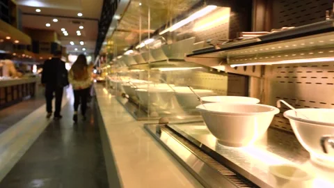 A Well-Designed Buffet Setup with Elegant White Bowls Displayed Prominently Stock Footage 317905449