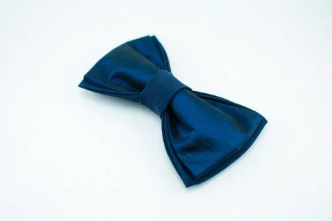 Well-designed stylish dark-blue bow tie made of soft cloth Stock Photos