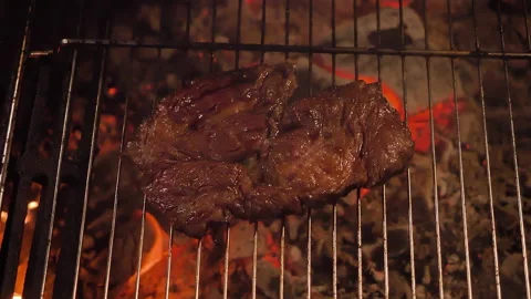 Well done on a BBQ grill over quiet coals. Stock Footage 135607360