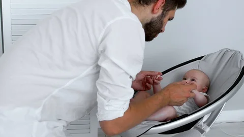 Well done father spends time with his baby son Stock Footage 92110080