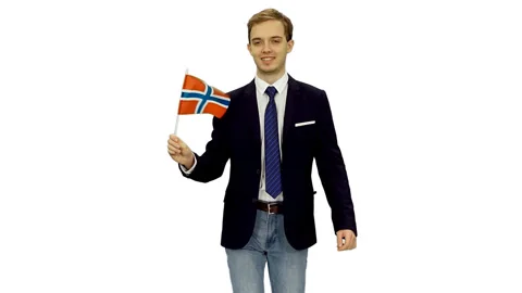 Well dressed guy student in suit jacket walks with waving flag of Norway, alpha Stock Footage 123154322