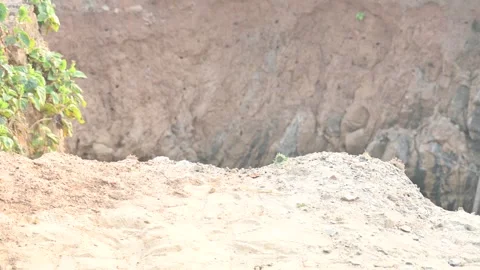 A well that has caved in during the rains. Stock Footage 336307920