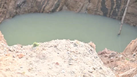 A well that has caved in during the rains. Stock Footage 336307956
