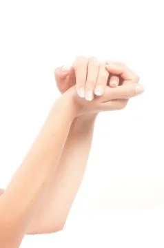 Well-kept woman's hands making gestures or numbers Stock Photos