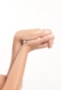 Well-kept woman's hands making gestures or numbers Stock Photos