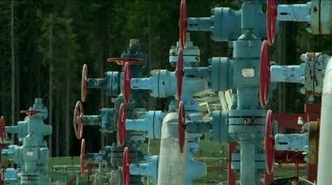Well pad with a oil well's (christmas tree equipment). Stock Footage