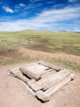 Well in the steppe Stock Photos