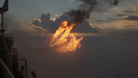 Well testing operation (flaring) of an oil and gas drilling rig Stock Footage