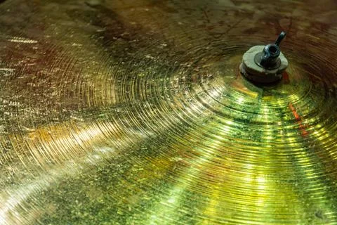 Well-Used Circular Drum Kit Cymbal with Dynamic Reflections and Textures Stock Photos