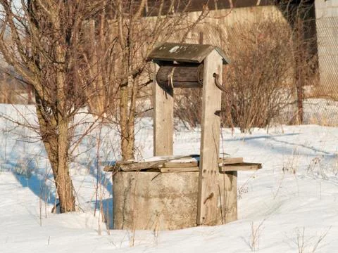 Well in winter Stock Photos