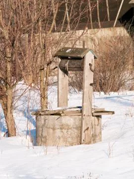 Well in winter Stock Photos