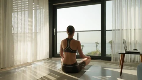 Wellness and Remote Work Concept with Woman Meditating by the Sea Vídeos de archivo 346104710