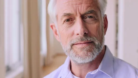 Wellness, face and man in home with pride, positive attitude or chill on weekend Stock Footage 332542249