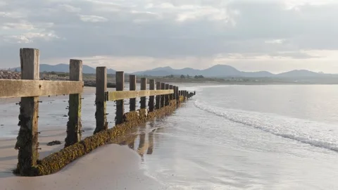 Welsh coast looking towards Eryri National Park, North Wales, UK Video stock 334443799