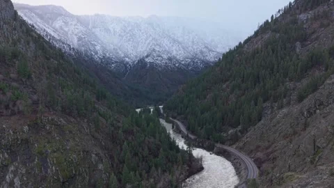 Wenatchee River Through Winter Mountain Canyon in Leavenworth Washington Stock-Footage 344767871
