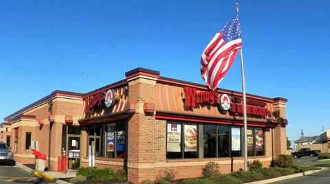 Wendy's Restaurant with flag Stock Footage 34084484