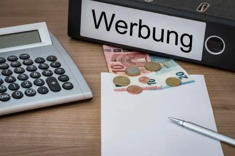 Werbung written on a binder Stock Photos