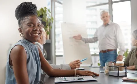 Were all here to make a difference. a young businesswoman in a meeting at work. Stock Photos
