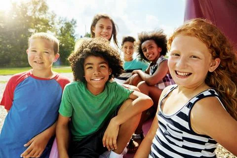 Were all set for a day of fun. Portrait of a group of diverse and happy kids Stock Photos