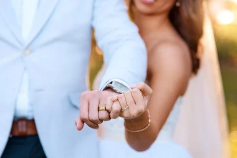 Were fully committed to each other. a newlywed couple showing off their wedding Fotos de archivo