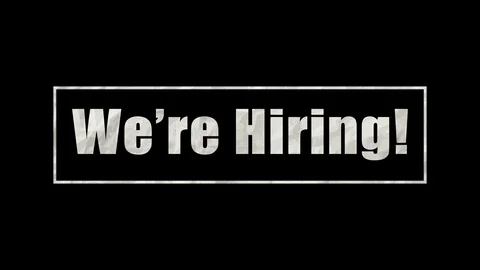We're Hiring text animating in and out with Moving Paper Texture Stock Footage 113563014