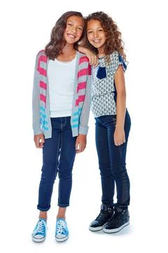 Were inseparable. Studio portrait of two best friends posing against a white Stock Photos