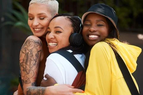 Were inseparable. three close friends spending the day together in the city. Stock Photos