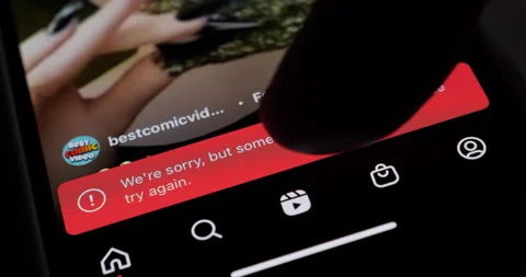 We're sorry, but something went wrong, Please try again message in Instagram app Stock Footage 162490477